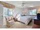 Bright bedroom with a comfortable bed and lake view at 506 Fairways Cir # B, Ocala, FL 34472