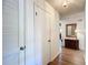 Condo entryway with light wood floors and white walls at 506 Fairways Cir # B, Ocala, FL 34472