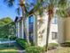 Condo building side view, showcasing its design and landscaping at 506 Fairways Cir # B, Ocala, FL 34472