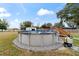 Expansive backyard with an above ground pool at 6292 Se 87Th St, Ocala, FL 34472