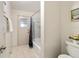 Bathroom with shower/tub combo and exterior access at 6292 Se 87Th St, Ocala, FL 34472