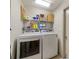 Laundry room with washer, dryer, and shelving at 6292 Se 87Th St, Ocala, FL 34472