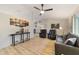 Bright living room featuring hardwood floors and a ceiling fan at 6292 Se 87Th St, Ocala, FL 34472