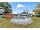 Relaxing backyard oasis with an above ground pool and deck at 6292 Se 87Th St, Ocala, FL 34472