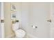Clean half-bathroom, offers essential facilities in a minimalistic design, maximizing space and functionality at 6407 Sw 45Th Ave, Ocala, FL 34474