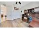 Home office featuring a ceiling fan, closet and built-in desk space perfect for remote work at 6407 Sw 45Th Ave, Ocala, FL 34474