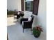 Cozy front porch featuring outdoor seating and decorative planters, creating a relaxing space at 7682 Sw 89Th Ct, Ocala, FL 34481