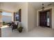 Inviting front porch with comfortable seating and charming decor, creating a welcoming entrance at 7682 Sw 89Th Ct, Ocala, FL 34481