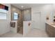 Large walk-in shower with neutral tile and built-in seat at 7682 Sw 89Th Ct, Ocala, FL 34481