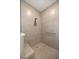 Walk-in shower with a built-in seat and grab bar at 7682 Sw 89Th Ct, Ocala, FL 34481