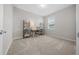 Bright bedroom with carpeted floor and built-in shelving at 8456 Sw 52Nd Lane Rd, Ocala, FL 34481