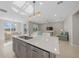 Modern kitchen island with sink and breakfast bar at 8456 Sw 52Nd Lane Rd, Ocala, FL 34481