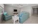 Spacious living room with comfy teal sofas and decor at 8456 Sw 52Nd Lane Rd, Ocala, FL 34481