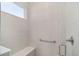 Walk-in shower with built-in seat and grab bar at 10210 Sw 99Th Ln, Ocala, FL 34481