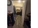 Open walk-in closet featuring shelves and clothing racks for organization at 113 Guava Ter, Ocklawaha, FL 32179