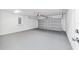 Spacious garage with gray epoxy floor at 127 Marion Oaks Golf Way, Ocala, FL 34473