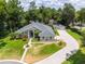 Single-Gathering home with large yard and circular driveway at 2215 Se Spring Hill Ct, Ocala, FL 34471