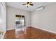 Bedroom featuring hard wood floors and sliding glass doors to a screened patio at 36323 Piney Ridge Blvd, Fruitland Park, FL 34731