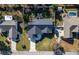 Overhead view of a house with a gray roof and manicured lawn at 4216 Se 7Th Pl, Ocala, FL 34471