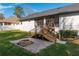 Relaxing backyard oasis with a fire pit and expansive patio at 4216 Se 7Th Pl, Ocala, FL 34471