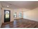 Spacious dining room with hardwood floors and modern chandelier at 4216 Se 7Th Pl, Ocala, FL 34471