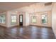 Open concept dining area with hardwood floors and chandelier at 4216 Se 7Th Pl, Ocala, FL 34471