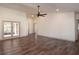 Spacious living room featuring hardwood floors and access to a patio at 4216 Se 7Th Pl, Ocala, FL 34471