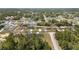 Neighborhood with single-Gathering homes, paved streets, green trees, and proximity to nature at 4393 Sw 169 Lane Rd, Ocala, FL 34473