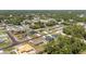 Single-Gathering homes in a neighborhood with green trees, paved roads, and manicured lawns at 4393 Sw 169 Lane Rd, Ocala, FL 34473