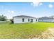 Lush green grass fills the home's backyard space at 4393 Sw 169 Lane Rd, Ocala, FL 34473