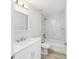 Clean bathroom with white vanity, marble shower, and bathtub at 4393 Sw 169 Lane Rd, Ocala, FL 34473