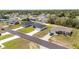 New construction single Gathering homes with well-maintained lawns, paved driveways, and landscaping at 4393 Sw 169 Lane Rd, Ocala, FL 34473
