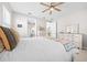 Bright bedroom with a queen-size bed and access to the bathroom at 5624 Sw 88Th Ave, Ocala, FL 34481