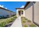 Welcoming front entry with a walkway and landscaping at 5624 Sw 88Th Ave, Ocala, FL 34481