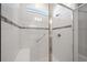 Spacious walk-in shower with subway tile and bench seat at 5624 Sw 88Th Ave, Ocala, FL 34481