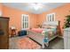 Bedroom with a floral comforter and a ceiling fan at 7451 Se 24Th Ter, Ocala, FL 34480