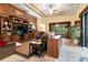 Spacious living room with wood built-ins and a view into the kitchen at 7451 Se 24Th Ter, Ocala, FL 34480