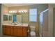 Double vanity bathroom with shower and toilet at 8852 Se 119Th St, Summerfield, FL 34491