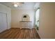 Light and bright bedroom with wood-look floors and ceiling fan at 8852 Se 119Th St, Summerfield, FL 34491