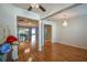 Open concept dining room with hardwood floors and chandelier at 8852 Se 119Th St, Summerfield, FL 34491