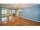 Elegant dining room with hardwood floors and chandelier at 8852 Se 119Th St, Summerfield, FL 34491