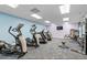 Bright fitness center featuring modern exercise equipment, treadmills, and stationary bikes at 9625 Sw 207Th Cir, Dunnellon, FL 34431