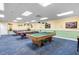 Community game room with a pool table, providing entertainment for residents at 9625 Sw 207Th Cir, Dunnellon, FL 34431