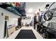 Organized garage with shelving, storage racks, and ample workspace at 10129 Sw 77Th Loop, Ocala, FL 34481