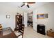 Comfortable office space with a desk, shelving, and laminate flooring at 10129 Sw 77Th Loop, Ocala, FL 34481