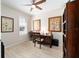 Well-lit office featuring wood floors, a ceiling fan, and tasteful wall decor at 10129 Sw 77Th Loop, Ocala, FL 34481
