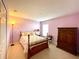 Charming bedroom with a double bed and a spacious closet at 1033 Sw 159Th St, Ocala, FL 34473