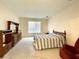 Spacious Primary bedroom with large window and a relaxing atmosphere at 1033 Sw 159Th St, Ocala, FL 34473