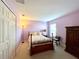 Cozy bedroom with double bed and wood furniture at 1033 Sw 159Th St, Ocala, FL 34473