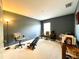 Home office with desk, chair, and exercise equipment at 1033 Sw 159Th St, Ocala, FL 34473